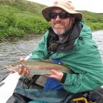Paul Adams, DJ Case web developer fishing in Alaska