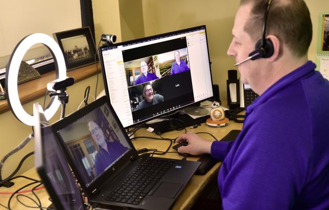 Image of Rick Clawson on video conference with Dave Case and Matt Harlow