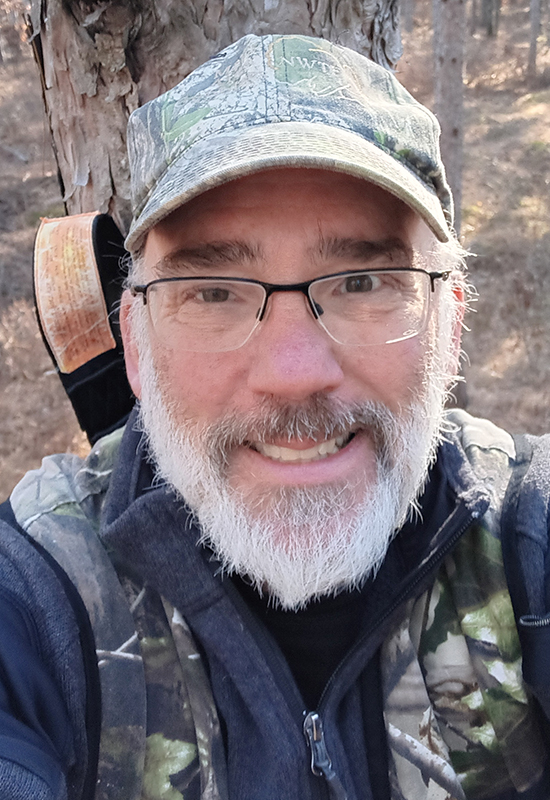 Close up of Holsman in a treestand